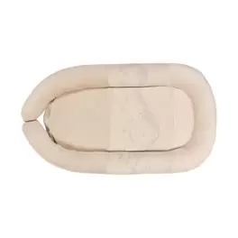 Aanbieding van Nanami Ribvelvet Hills Babynest - Naturel voor 89,95€ bij Babypark