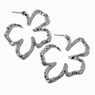 Aanbieding van Squiggle Flower Outline Silver-tone Hoop Earrings voor 6,49€ bij Claire's