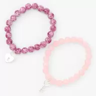 Aanbieding van Blush Pink Heart Lock & Key Beaded Stretch Bracelet - 2 Pack voor 4,99€ bij Claire's