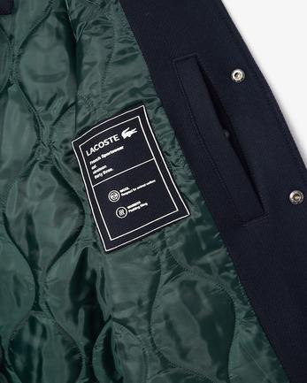 Aanbieding van Premium wollen Varsity Badge jack voor 550€ bij Lacoste