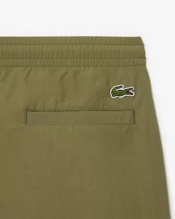 Aanbieding van Relaxed Fit Short met Ritszakken voor 100€ bij Lacoste