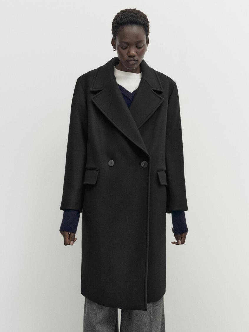 Aanbieding van Zwarte wollen comfort jas voor 99,95€ bij Massimo Dutti
